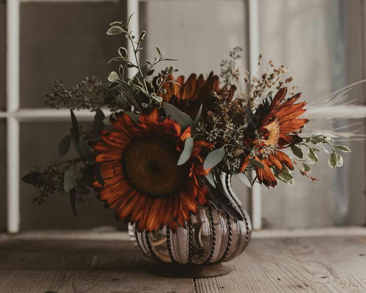 Autumn flower arrangement with sunflowers in warm Thanksgiving colours